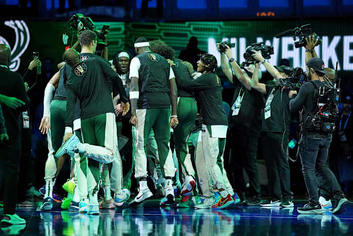 The Milwaukee Bucks huddle before paying against the Indiana Pacers